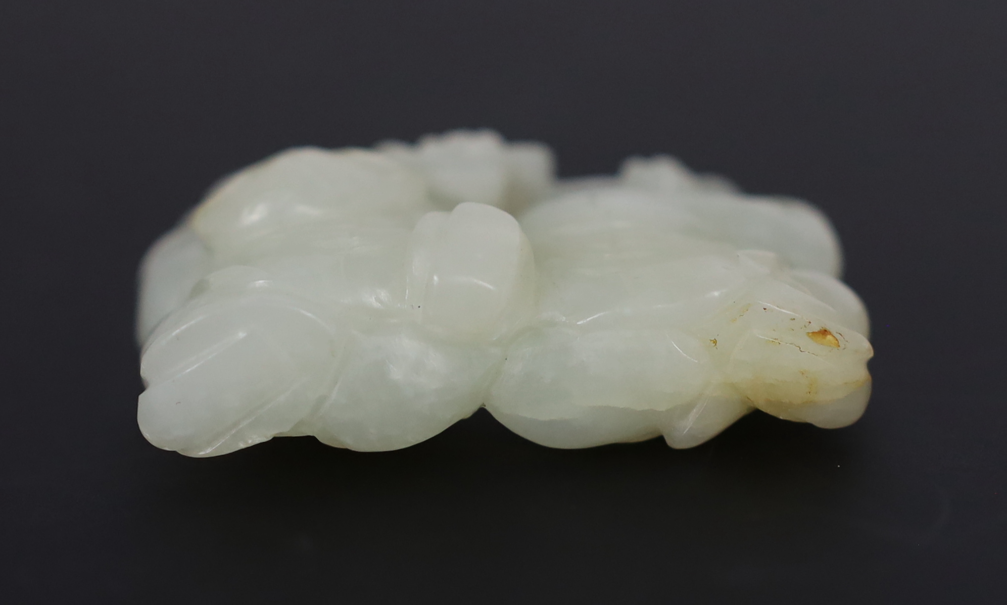 A Chinese pale celadon jade carving of the He He Erxian twins, 18th/19th century